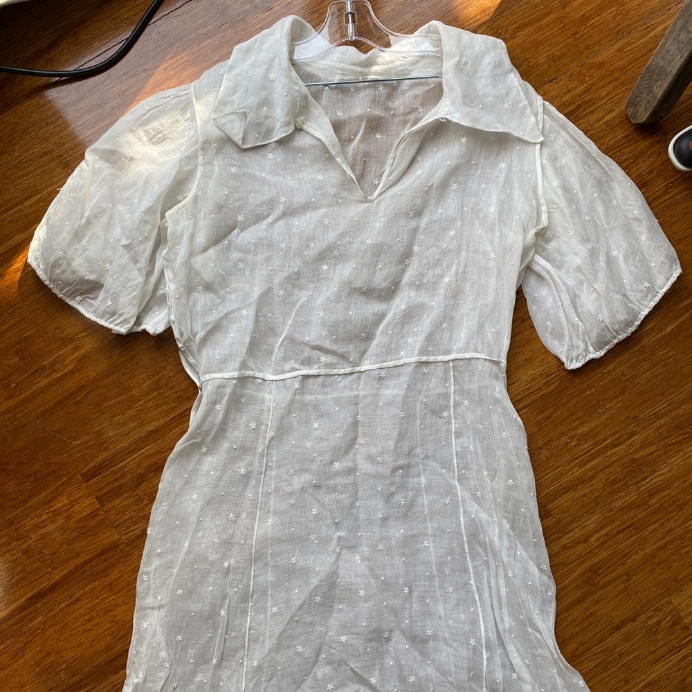 Vintage 1940s handmade sheer dress with puff sleeves. Fits a 28" waist.